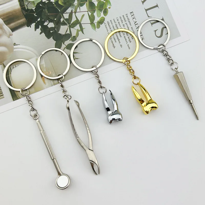 Creative simulation teeth keychain dental promotional gifts hang-up dentist tools keychain dental mirror dental forceps