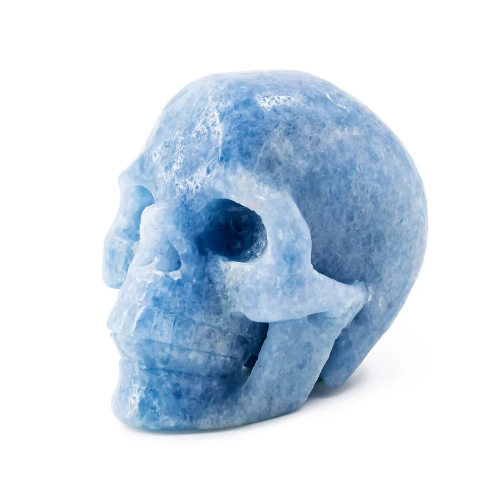 Wholesale natural high quality healing hand craved blue calcite crystal skulls crafts for home decoration