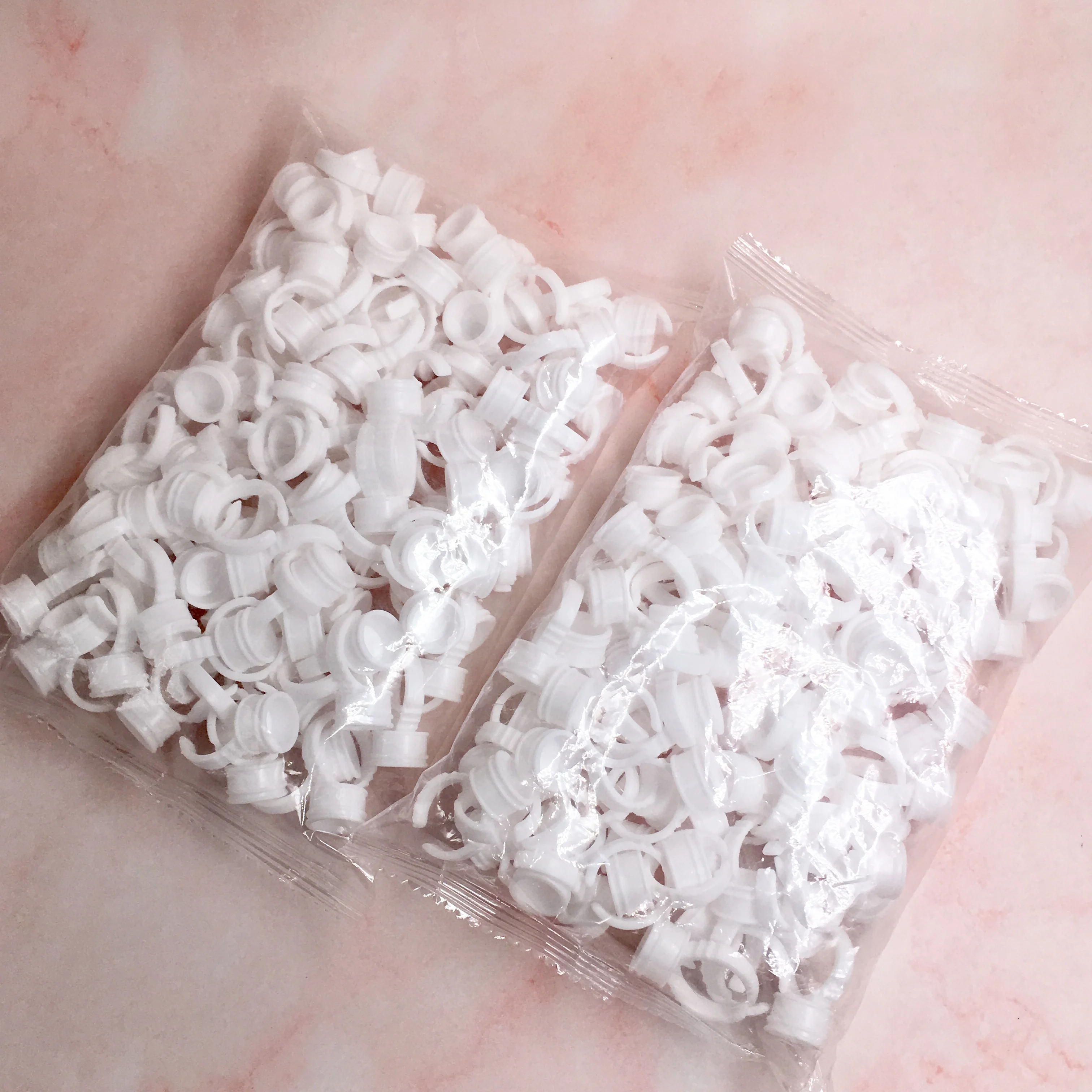 Wholesale Eyelash adhesive holder 100 pcs/pack Plastic Disposable Eyelash Extension Glue Plastic Eyelash Glue Rings