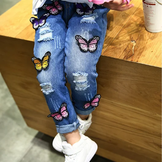 
New Design Girls Butterfly Denim Trousers Kids Fashion Washed Hole Jeans Pants  (62290627360)