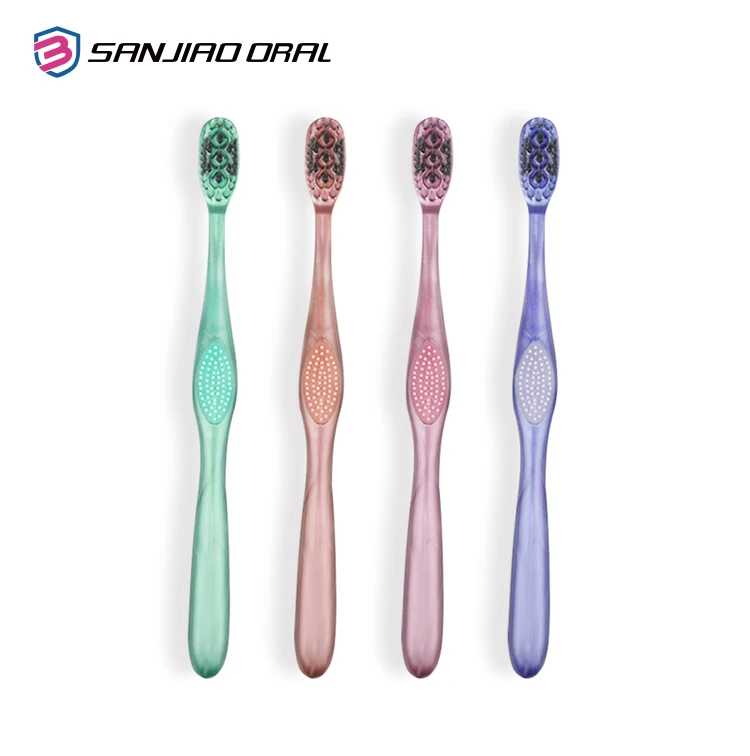2022 new design gum massage good quality adult toothbrush with tongue cleaner