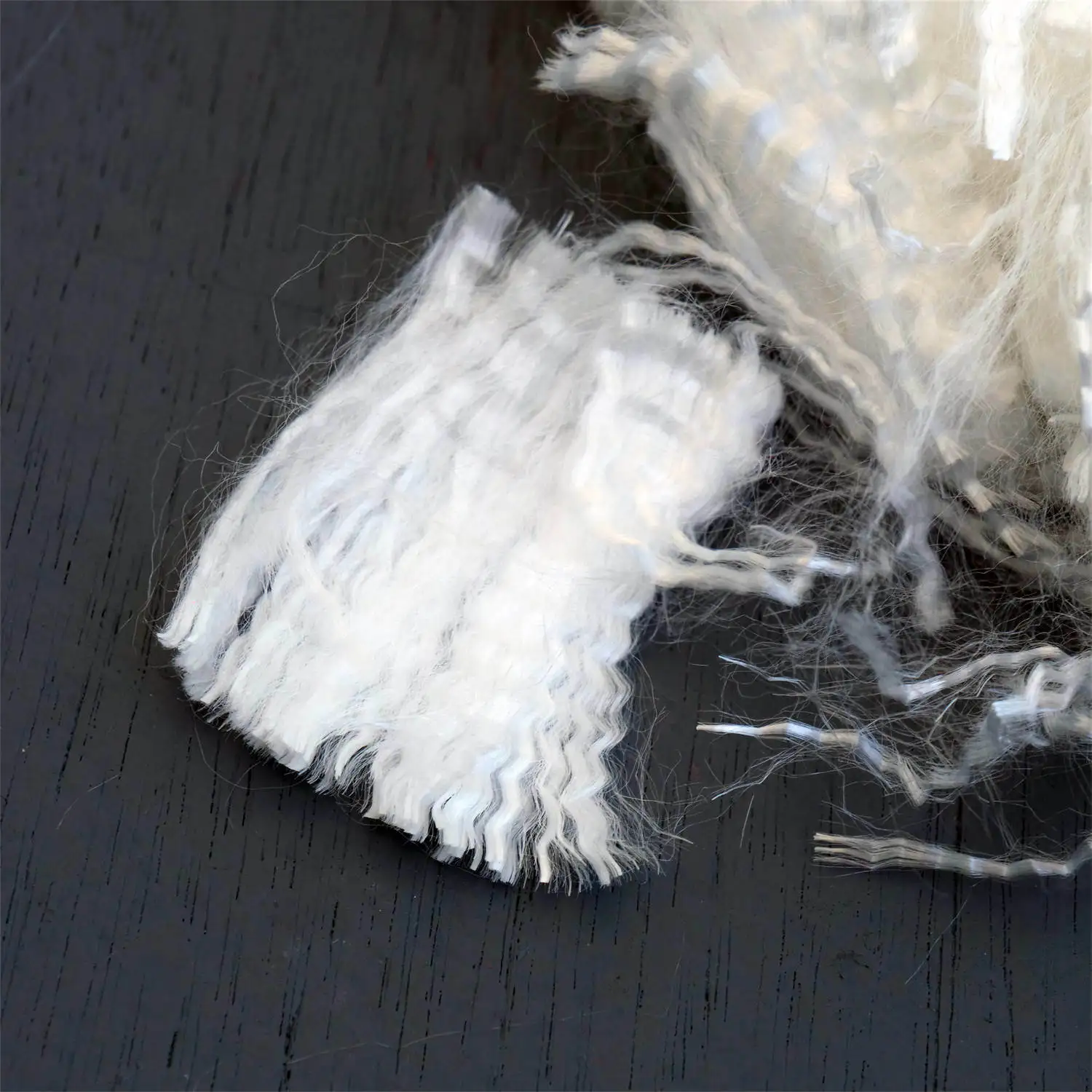 UHMWPE Short Cut Fiber for Enhancing Tensile Strength, Impact Resistance, and Stiffness in Concrete