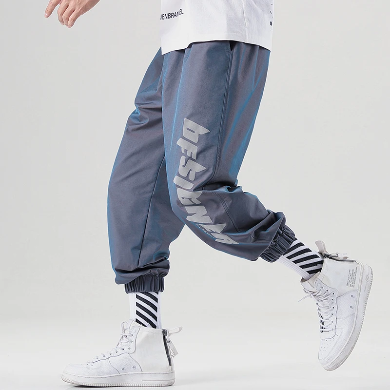 New style  color gradually change function recreational cargo pants male Korean version bright face reflects pair of