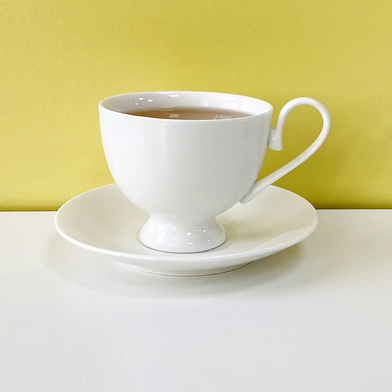 White New bone china porcelain ceramic coffee  tea cup and saucer set with print decal gold rim