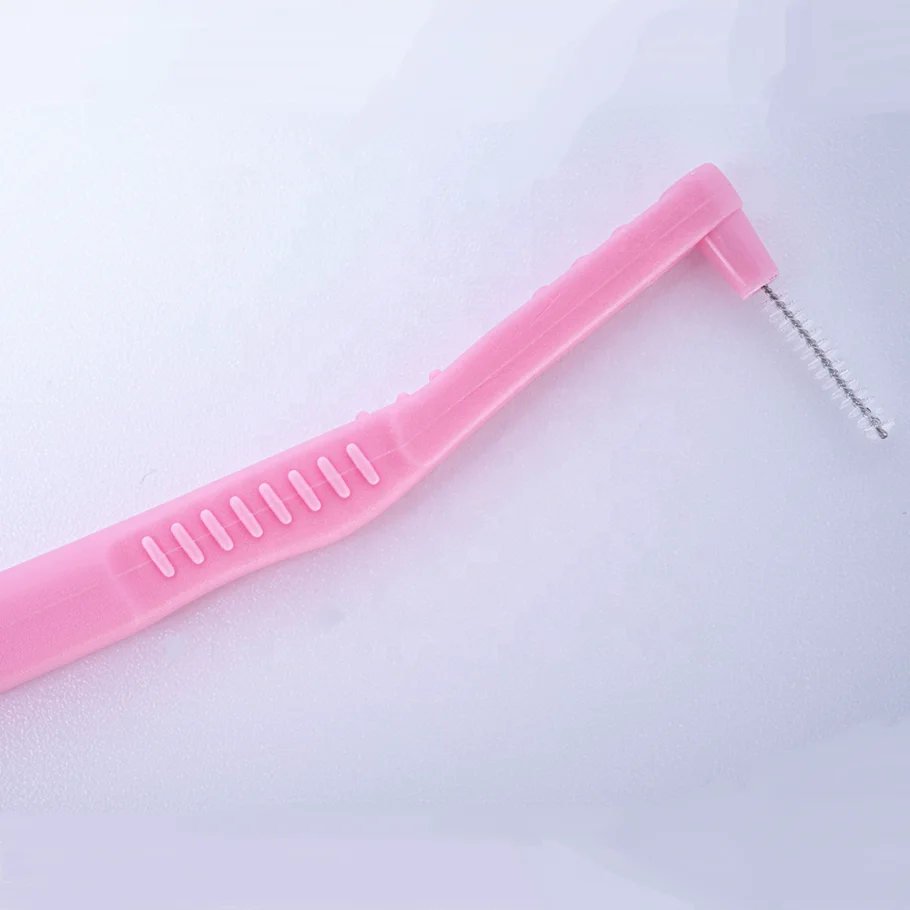 Wholesale L-shaped interdental brush cleans space between teeth and protects gums.
