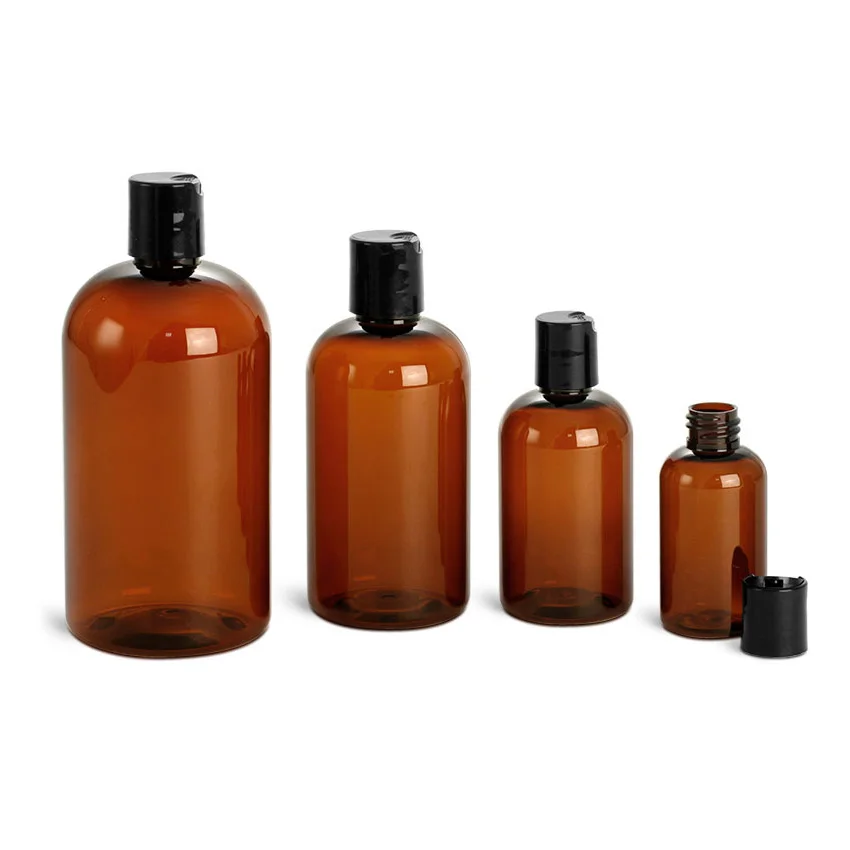 Amber PET Boston Round Bottles with Black Disc Top Caps
