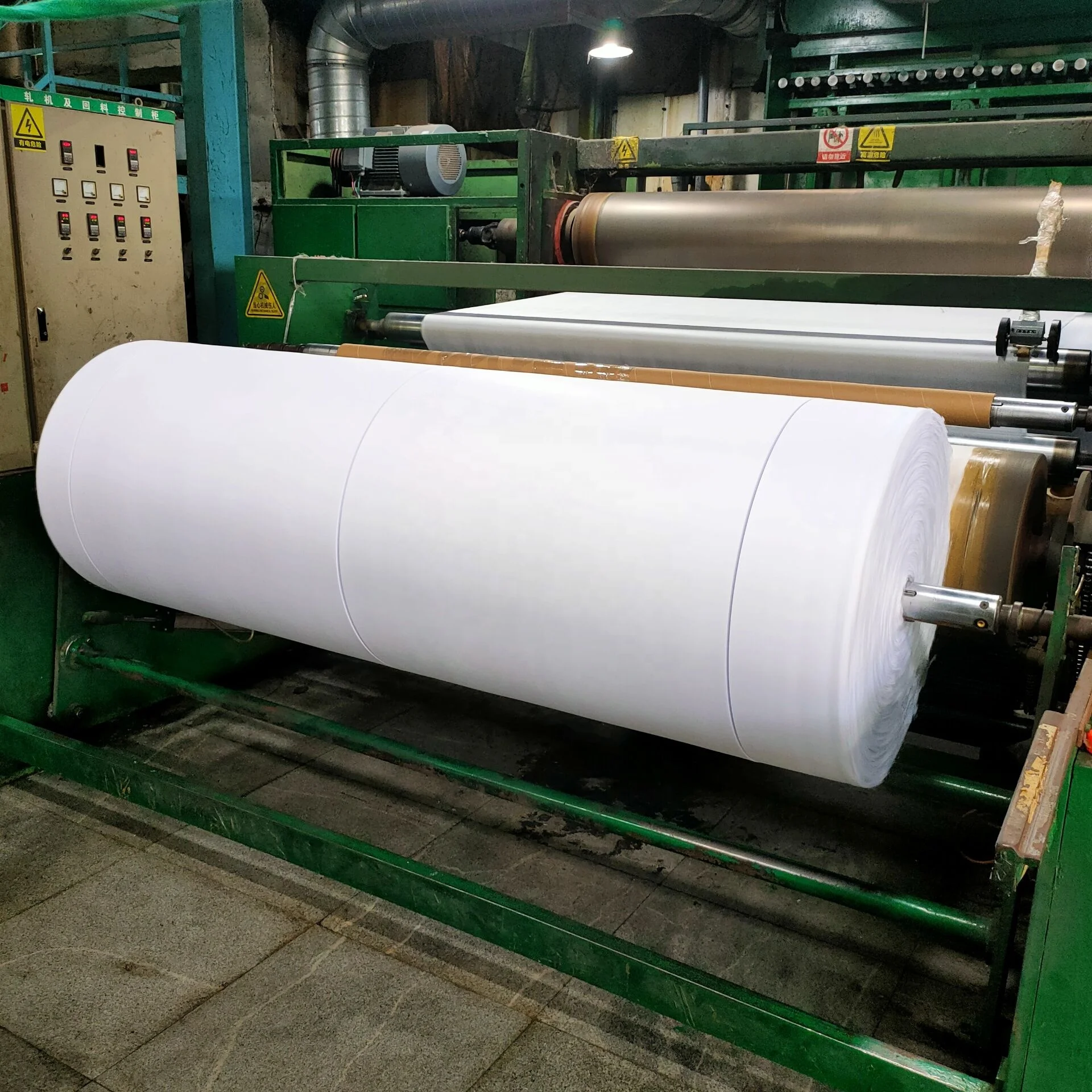sss	colored hot suzhou non-woven fabric,xinyuan modern non woven fabric raw material filter 35gsm pp spunbond