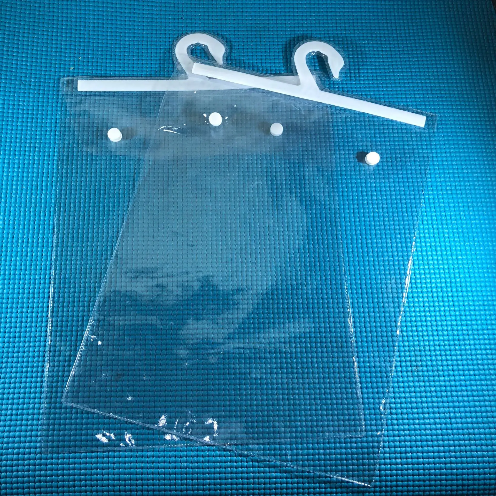 Wholesale pvc plastic packaging bag snap pvc packaging bag with plastic hanger hook bag