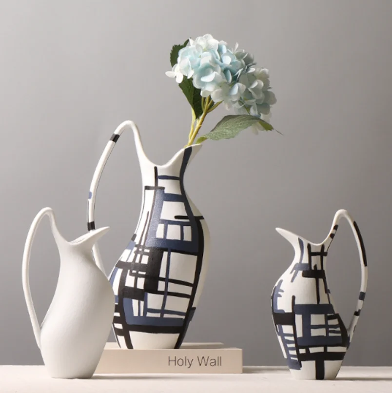 Modern simple hand-painted abstract pattern ceramic vase model room living room creative single ear flower vase ornaments