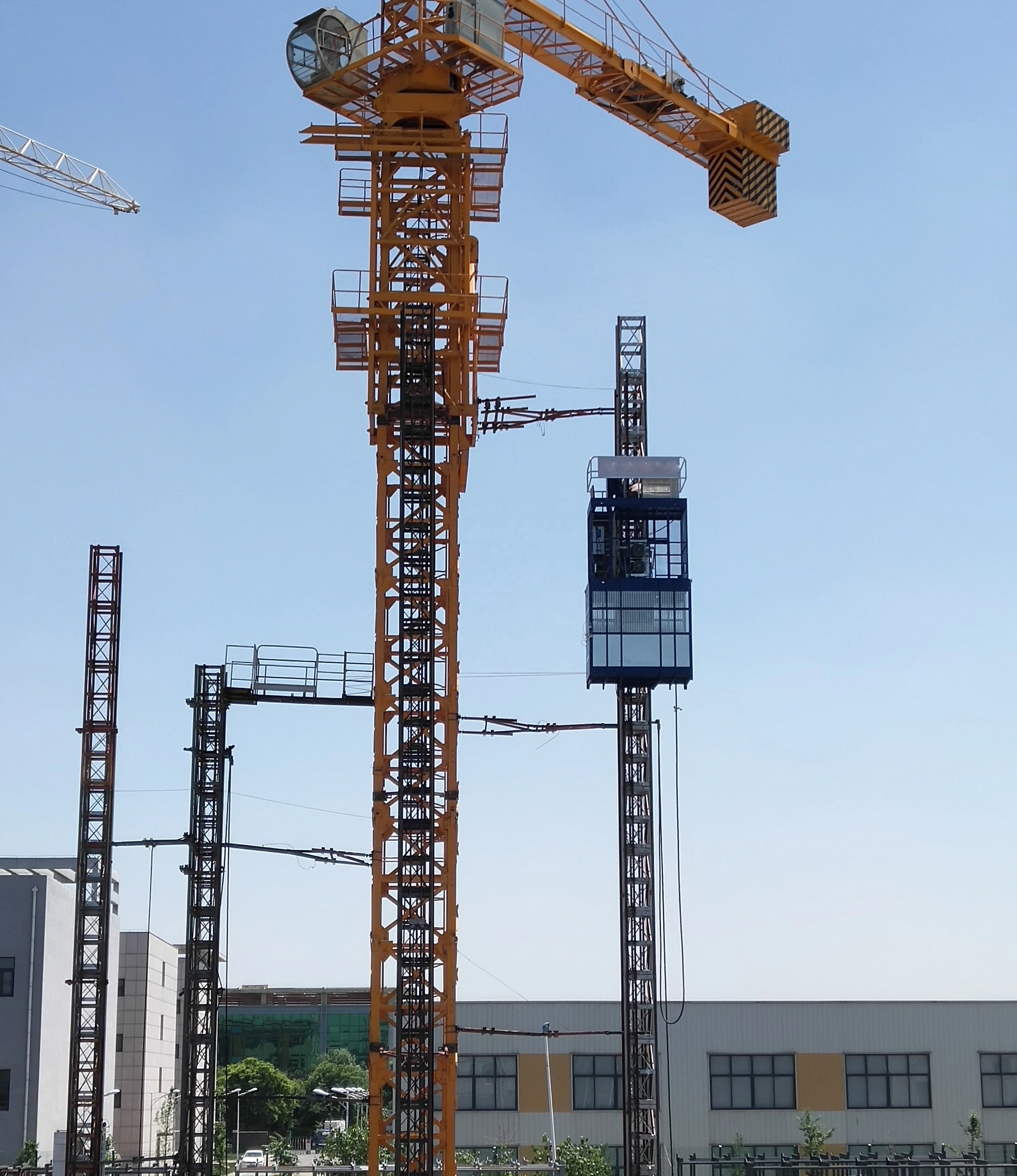 Cage type rack and pinion passenger and material lifter with stable and compact structure