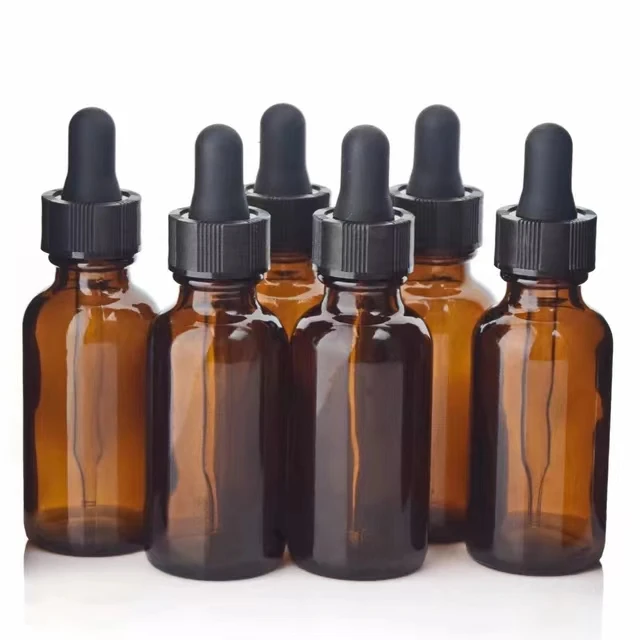 Factory 20ml 30ml amber essential oil cosmetic glass drop bottles with black dropper lid and matte black rubber top