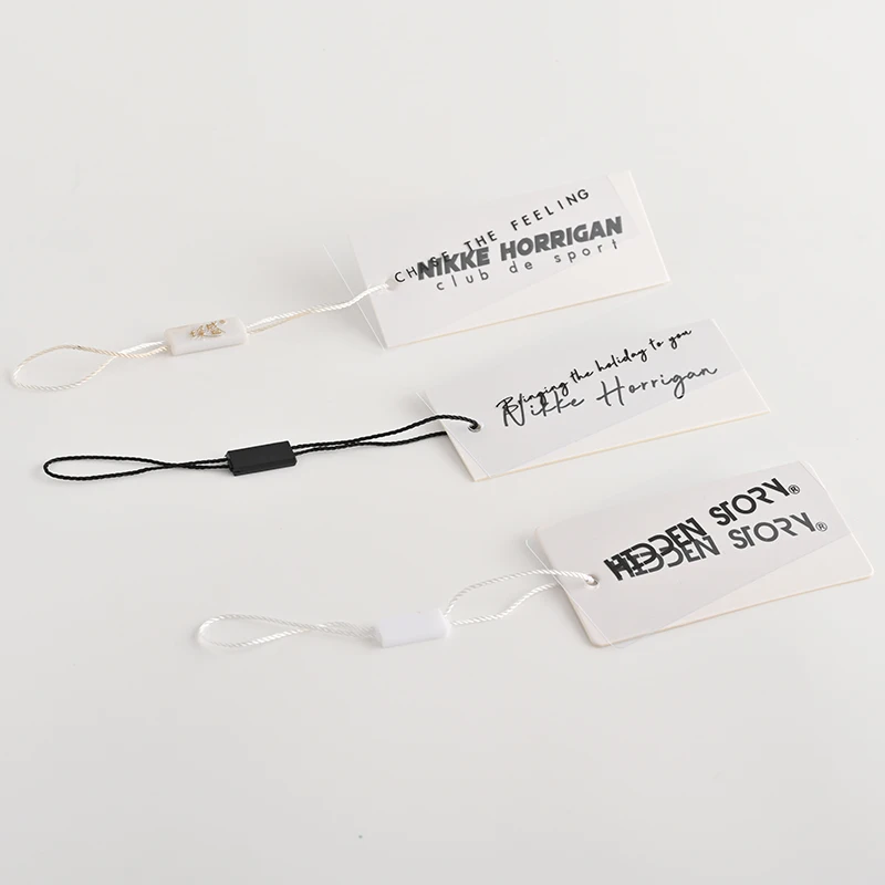 Custom Luxury 800gsm Thick Clothing Hang Tag Cardboard Garment Tags Transparent Frosted PVC Hang Tags With the Plastic Lock Rope