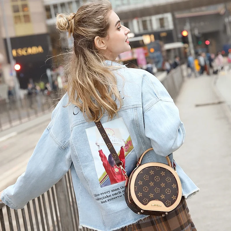 
2019 new fashion ladies trend printing retro portable slung small round bag 