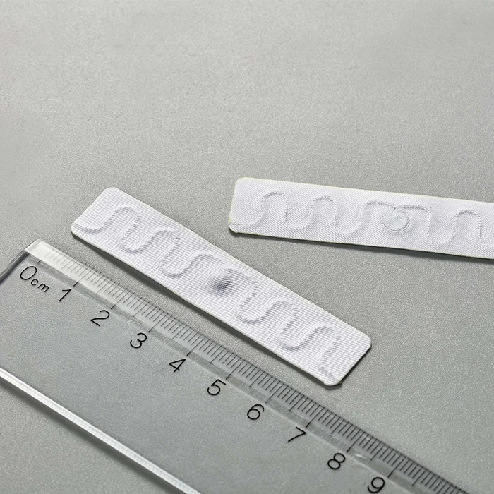 UHF High temperature and high pressure waterproof white fabric slim rfid tag for linen laundry