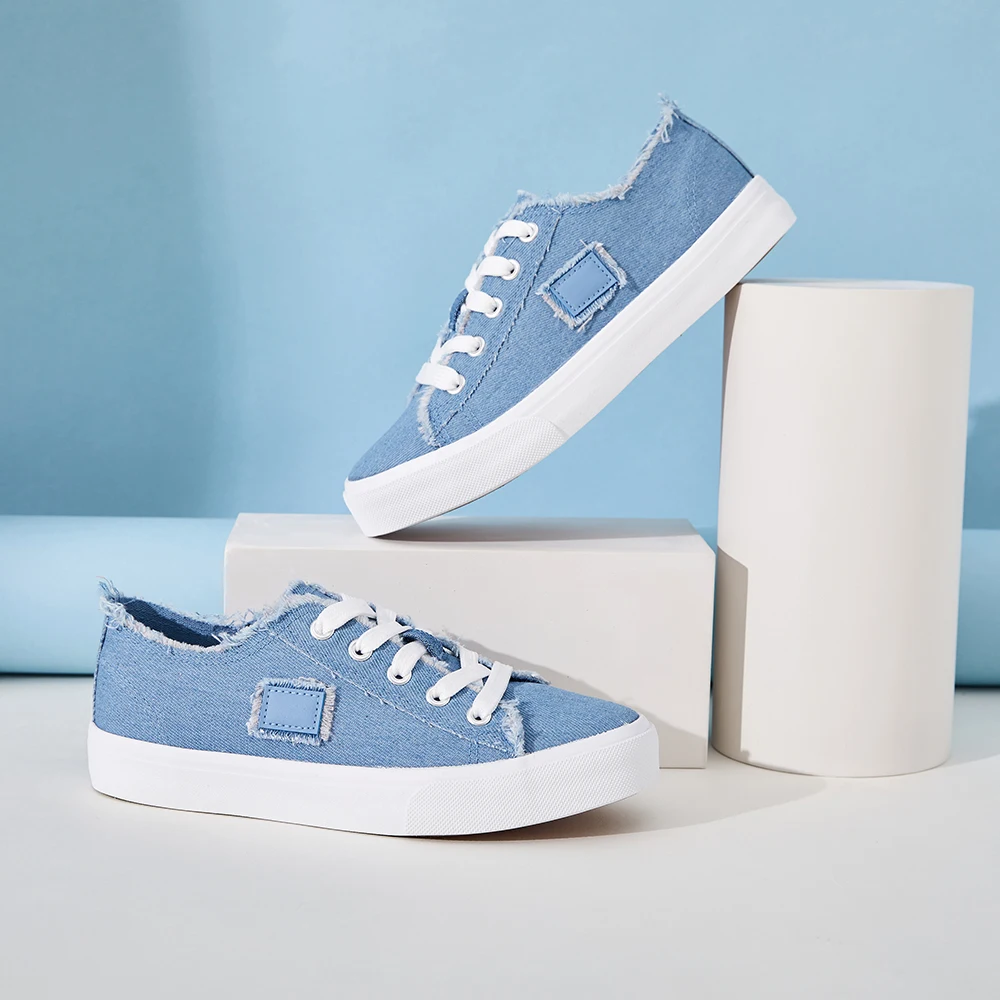 wenzhou factory fashion casual Customized LOGO rubber Unisex blue canvas shoes for women men new style 2024