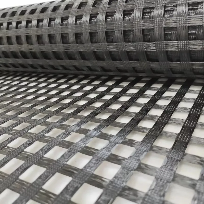 China Factory Price Fiberglass Mesh Biaxial Geogrid Fiberglass Geogrid 50KN 100KN Bitumen Coating Airport Driveway Asphalt Road