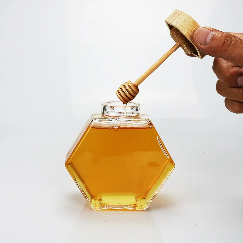 Wholesale 100ml 220ml 380ml Unique Hexagonal Glass Bottle Jar  For Honey with Wooden Lids and Dipper