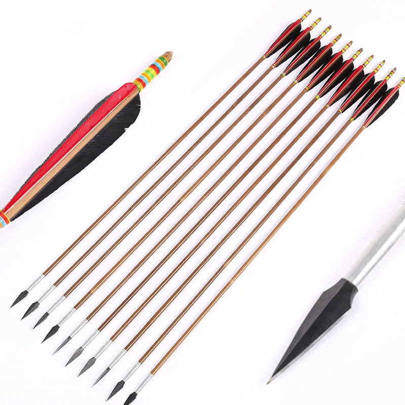 wooden arrow with turkey feather for traditional archery bow hunting and shooting