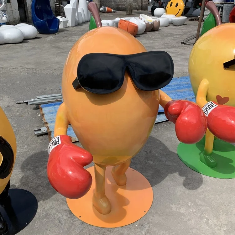 A cartoon sculpture of a glass fiber reinforced plastic mango Fruit model ornaments Outdoor cartoon  Resin fiber figuresculpture