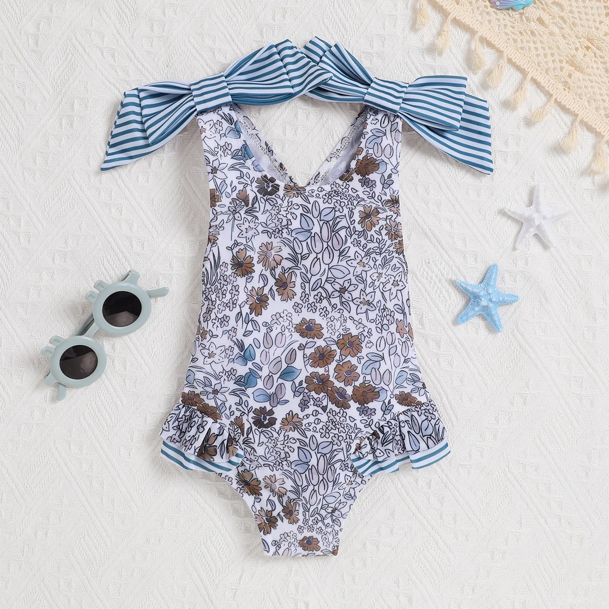 Wholesale New Playful Girl Floral Double Butterfly Knot Backless Cross Triangle Jumpsuit Swimwear