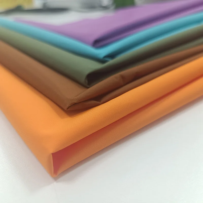 Custom color free sample breathable waterproof 75D 3 layer softshell jacket 260T pongee fabric for outdoor down jacket