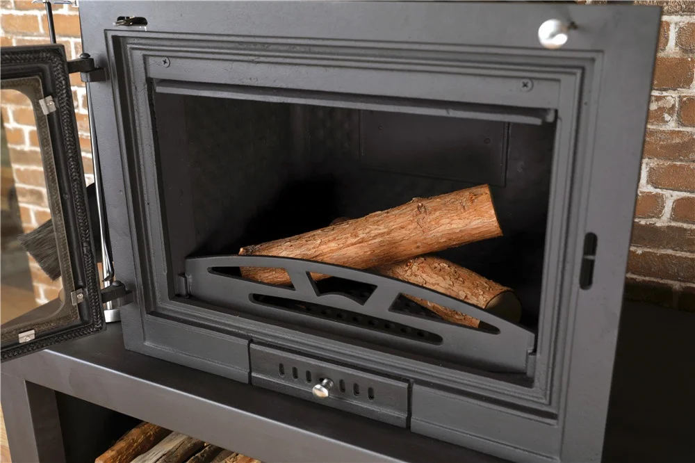 wood burning stove fireplace in home   cast iron stove fireplace    freestanding wood burning indoor stove