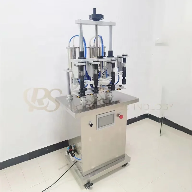 4 head Semi-automatic 500bph 1000bph liquid vodka whisky perfume small bottle filling machine