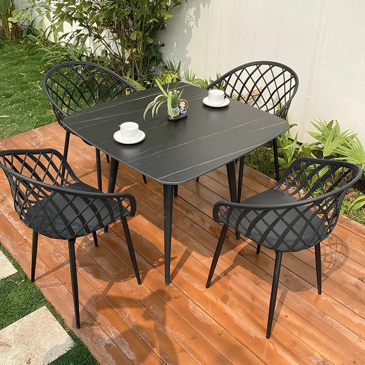 Outside Cheap Price Black Wholesale Modern Stackable Sillas Plastic  PVC Cafe Restaurant Plastic Chair With Parasol