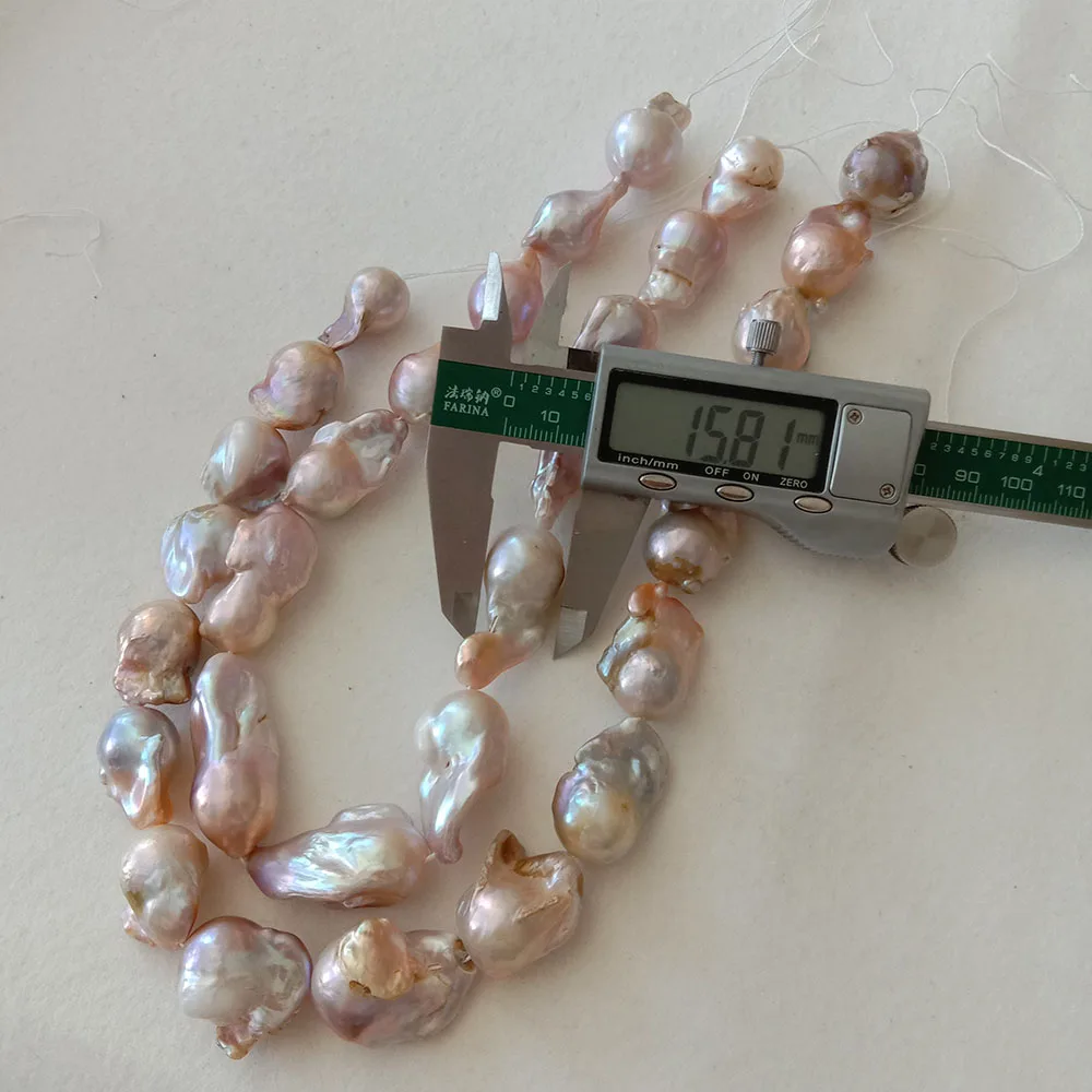 15-18 mm big baroque shape keshi pearl  loose freshwater pearl in strand . nature pink color