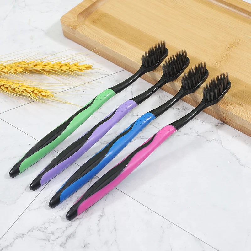 Factory direct best quality logo printed cheapest adult toothbrush black activated charcoal toothbrush