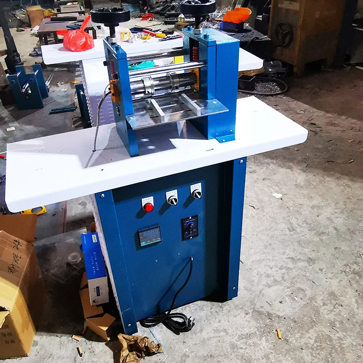 Роликовая машина для тиснения кожаных ремней