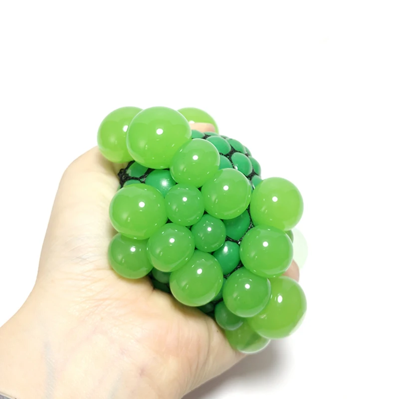 Wholesale Soft TPR Macarons Stress relieve Ball Squeeze Toy Net Ball With Fidget Toy Squishy Mesh Grape Ball For Kids
