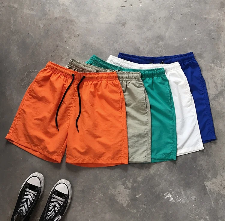 Customized Logo Men Summer Solid Color Beachwear Swim Trunks Wholesale Polyester Trunk Men's Swim Shorts 100% Polyester