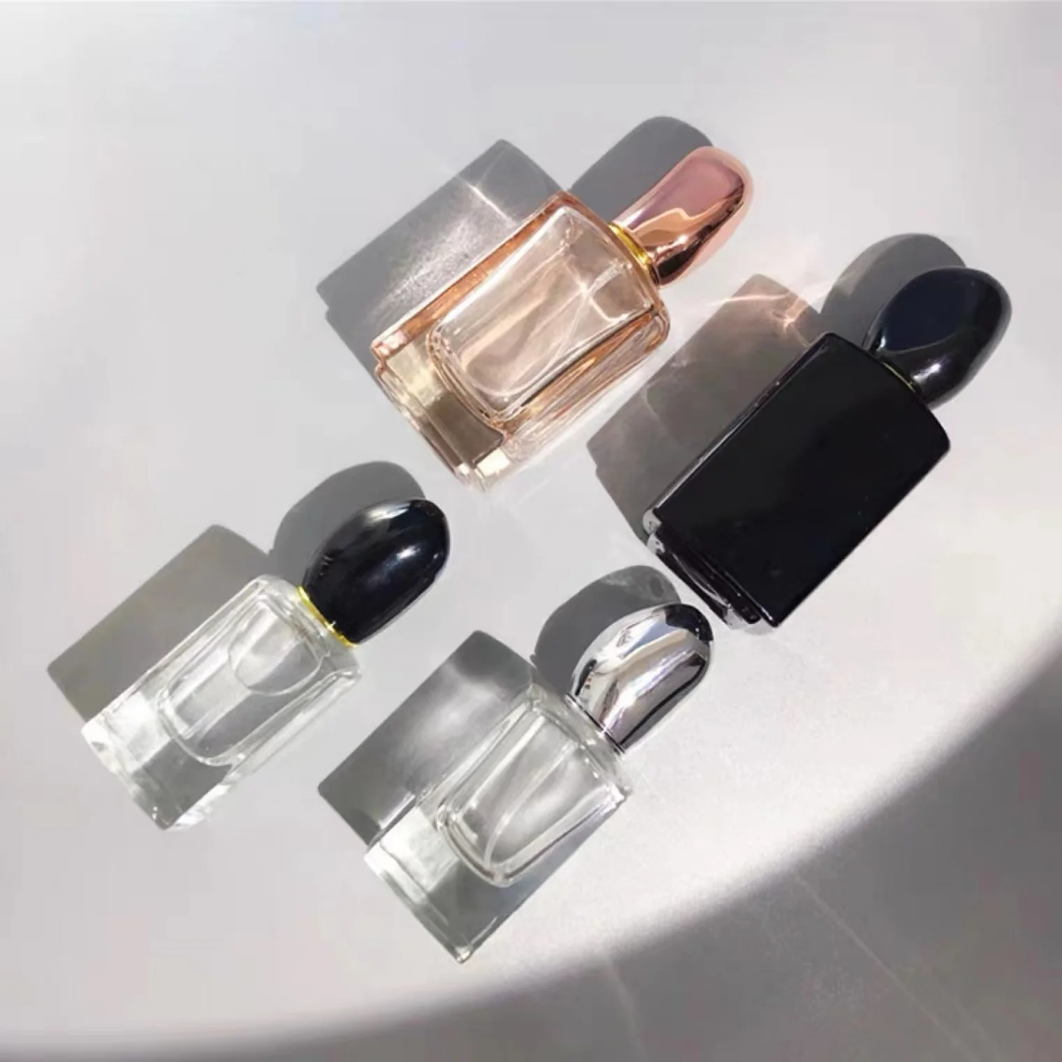 LOW MOQ Rectangle 30ML/50ML thick bottom orange colored perfume bottle with fancy lid