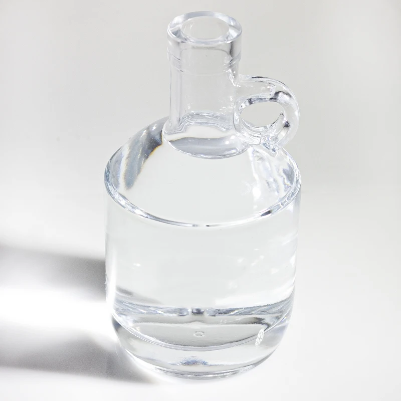 Custom Logo Ouzo Vodka Glass Bottle With Label Sticker Unique shape frosting empty whisky bottle 700ml with stopper