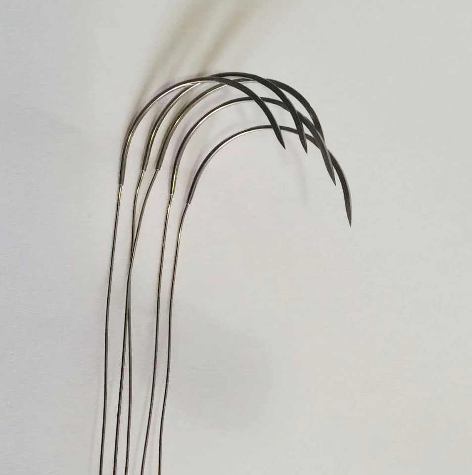 Veterinary surgical suture