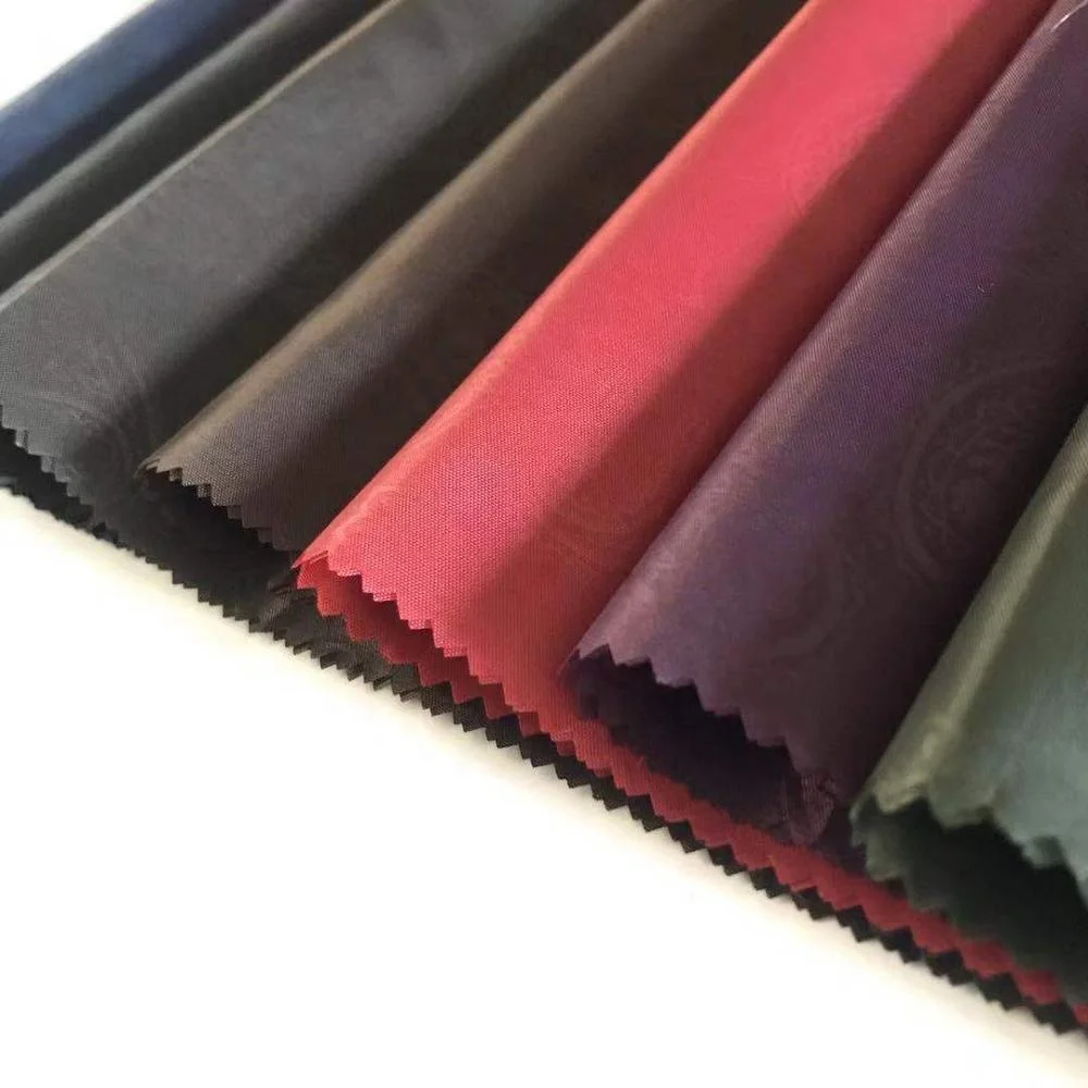 190T 210T Embossed Polyester Taffeta Lining Fabric 53GSM Dobby Design For Garment