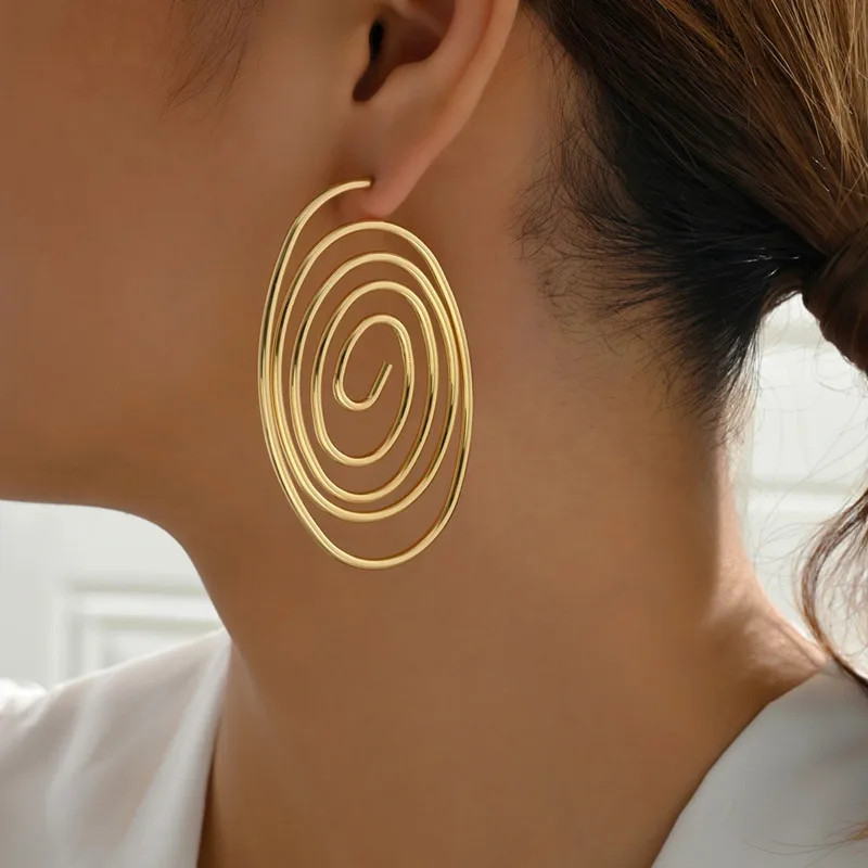 Fashion retro style geometric Metal Twisted earrings new metal spiral mosquito coil disc shaped earrings for women