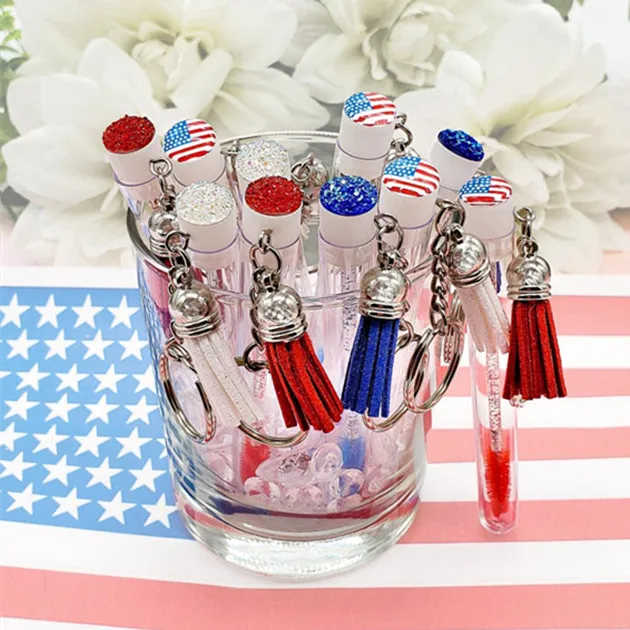 Hot sale pink white black lash brush tube jem spoolie in tube eyelash brush keychain