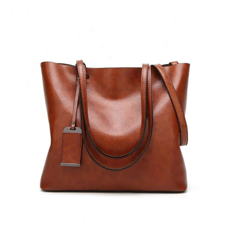 2021 custom logo cheap fashion and trend bags Large capacity PU Leather tag latest woman handbag