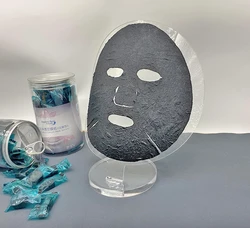 45gsm Black Activated Carbon Fiber Home Use Compressed Sheet Masks Viscose Spunlace Fabric Compressed Face Mask Tablets