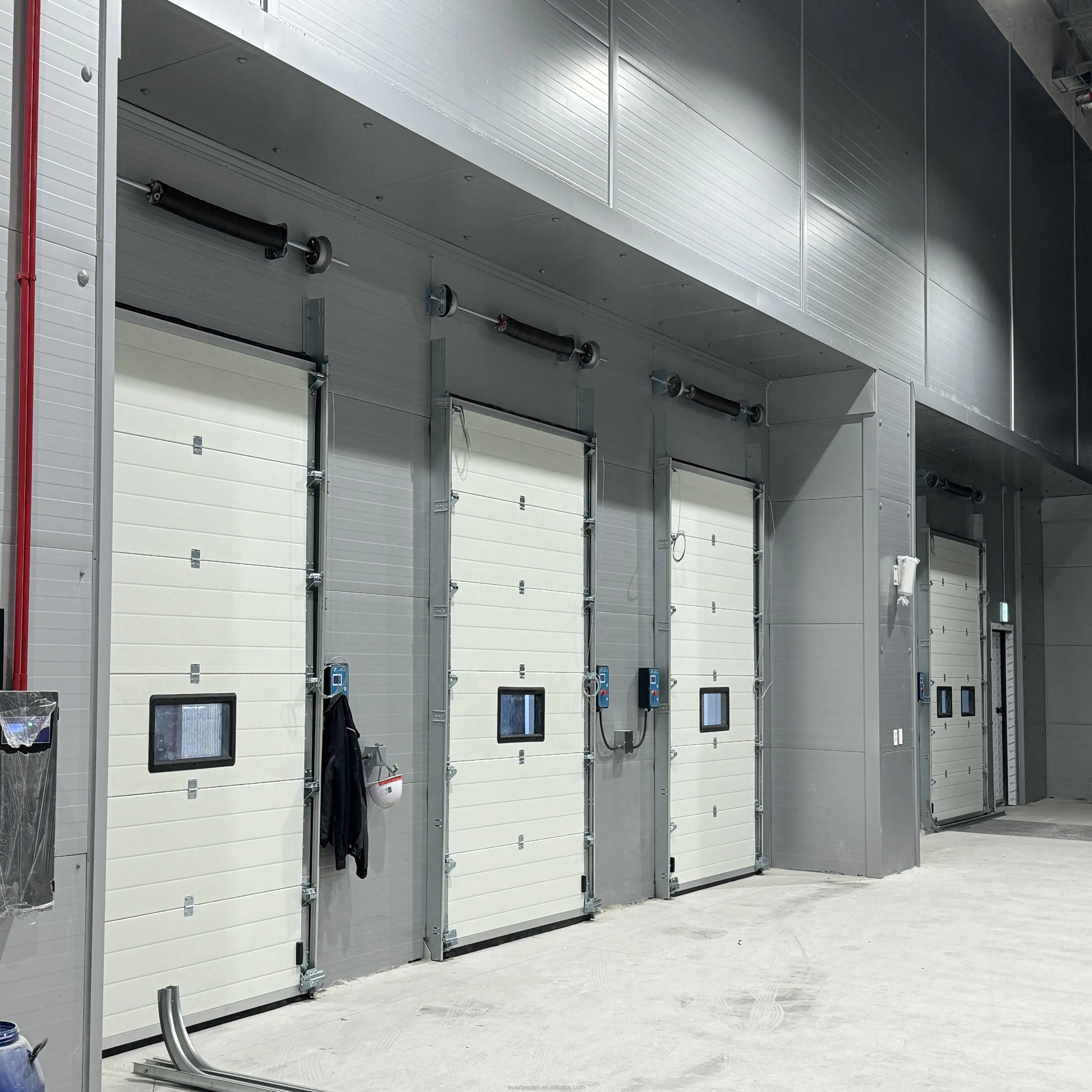 China Good Quality Vertical Overhead Electric Warehouse Industrial Sectional lifting Door