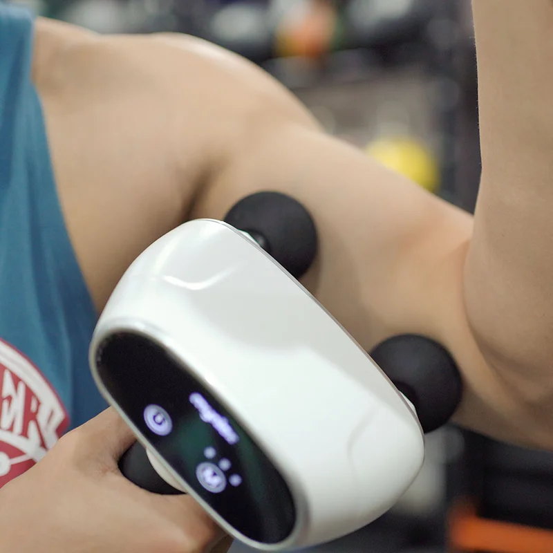 Amazon sells  custom deep tissue 3.7V 4 heads muscle Double-headed massage gun with Any scenario