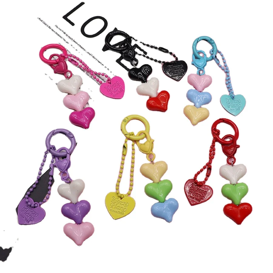 ins small fresh color love pendant Korean version of Macron heart pearl keychain headphone cover bag pendant