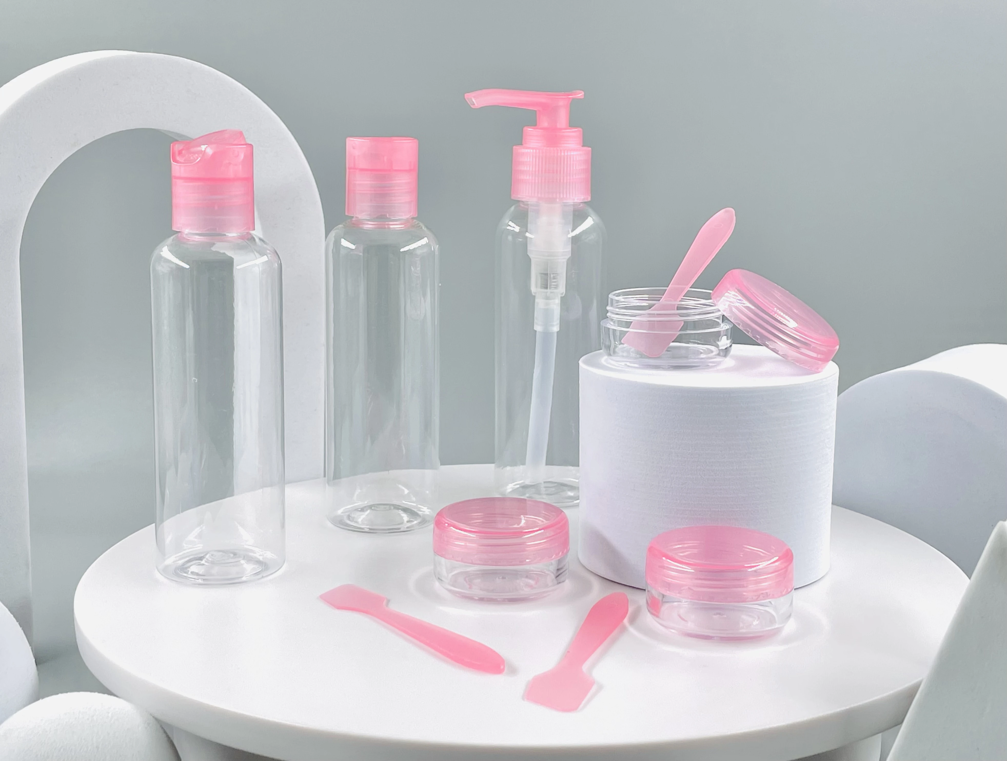 Wholesale Free Sample Refillable Empty Plastic Bottle and Cream Jar Travel Set for Cosmetic and Personal Care Liquid Use