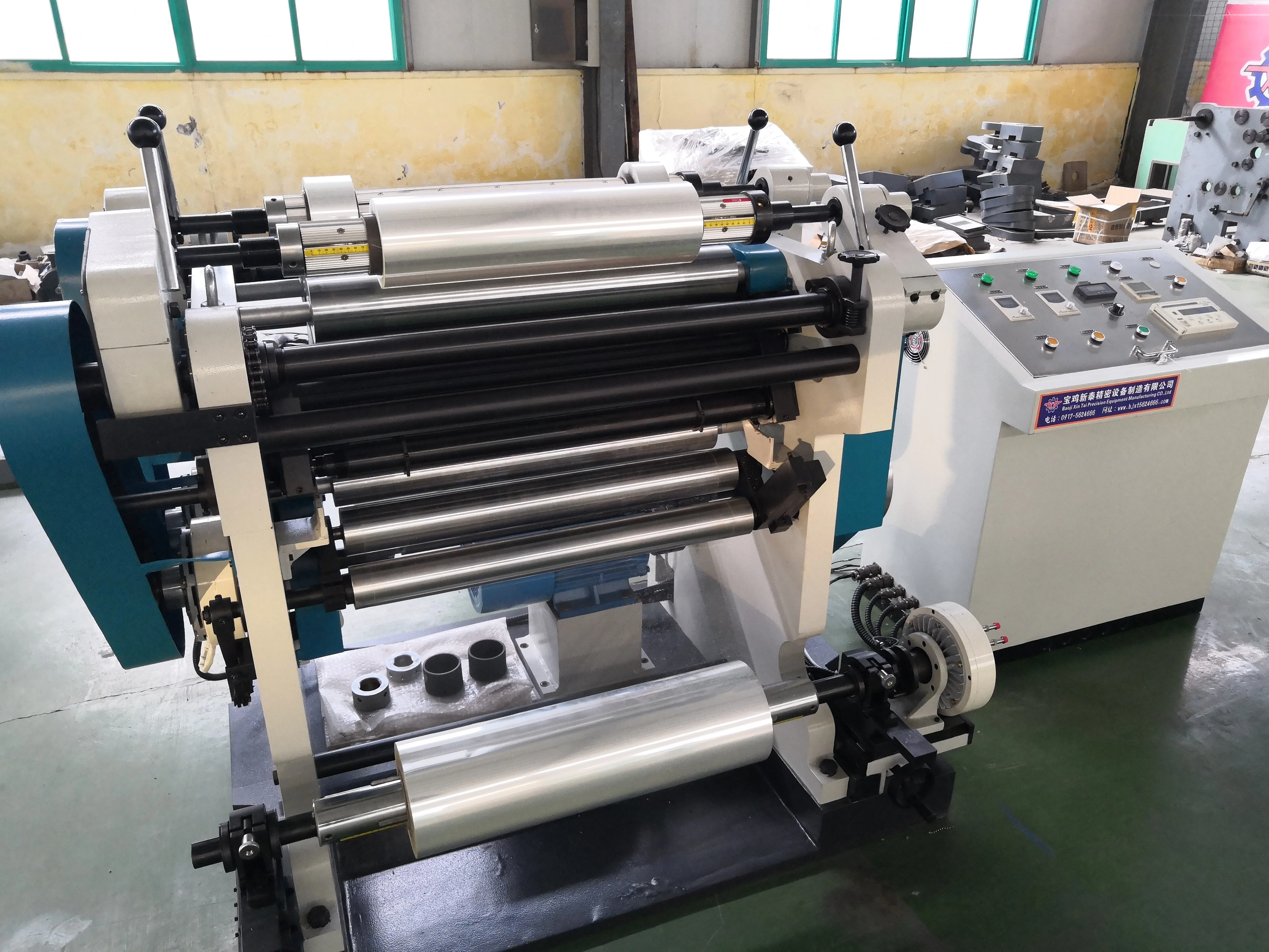
Economic kraft/brown/tape/gold/siliver/film paper slitting machine rewinding machine for sale from BAOJI XINTAI 