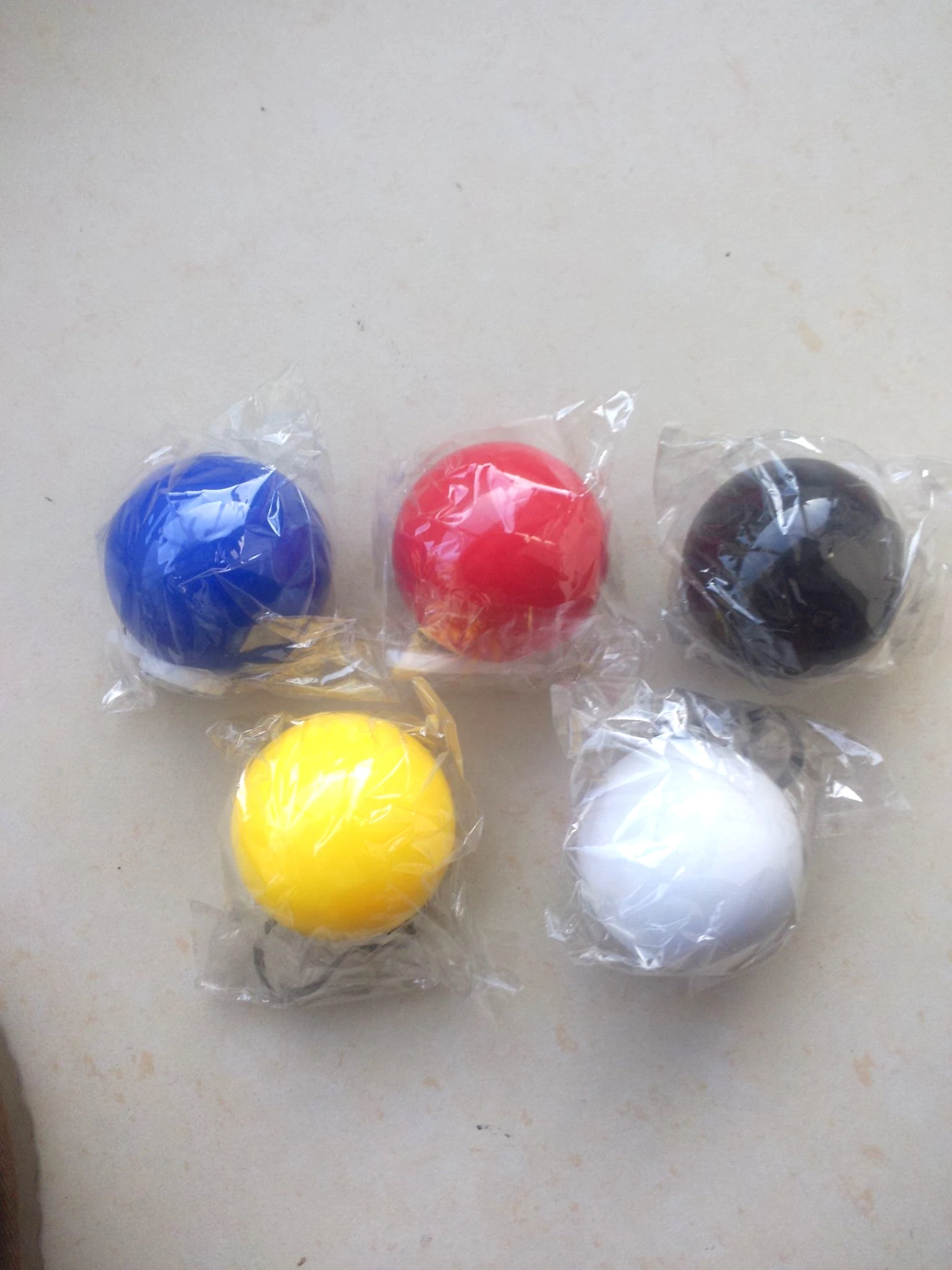 Disposable plastic transparent portable keychain PE rain poncho ball with custom