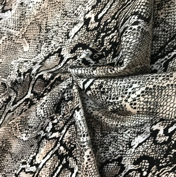 Hot sale interlock Luxury leopard printed knitted velour polyester fabric garment