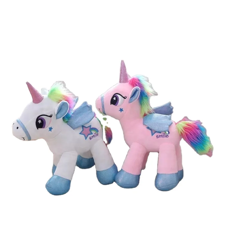 Plush big eye unicorn toy with flying wing and colourful mane and tail