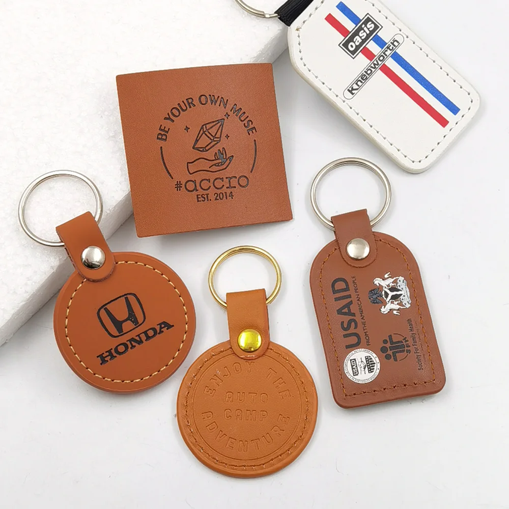 Promotional custom bulk blank sublimation luxury faux genuine pu car leather key chain holder custom brand logo leather keychain